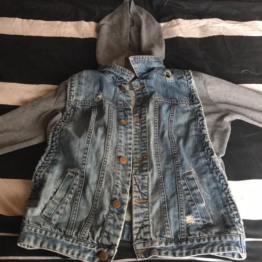 Jean jacket. Grey sleeves and hood. Bronze buttons